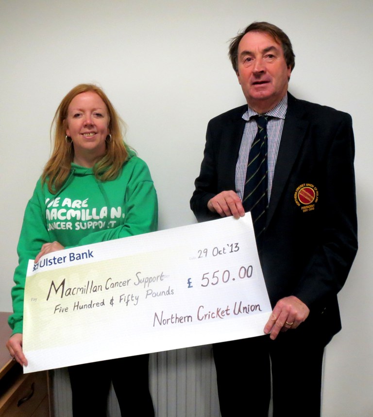 Northern Cricket Union present Macmillan with charity collection cheque